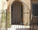 decorative arched gate and panels with spears